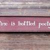 Wine is bottled poetry ~ 6"x26" ~ Handmade Wood Signs ~ Wine Decor ~ Rustic and Vintage Signs and Home Decor ~ Counry Cottage~ Shabby Chic Decor ~ Handcrafted by Crow Bar D'signs ~ Made in the USA ~ 6" x 36", $35.00 plus shipping